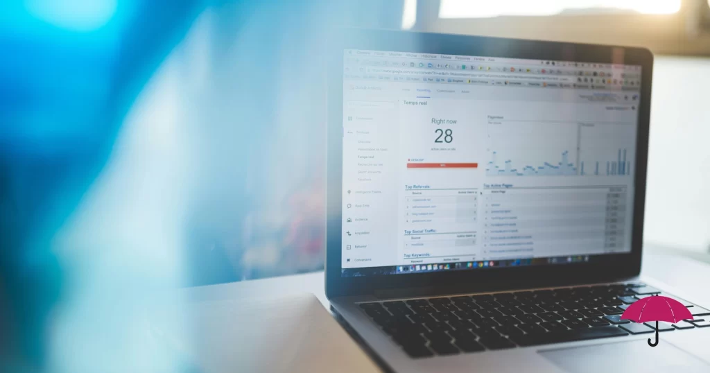 a computer showing website data compiled on Google Analytics