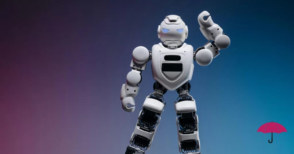 A white robot standing with one arm raised